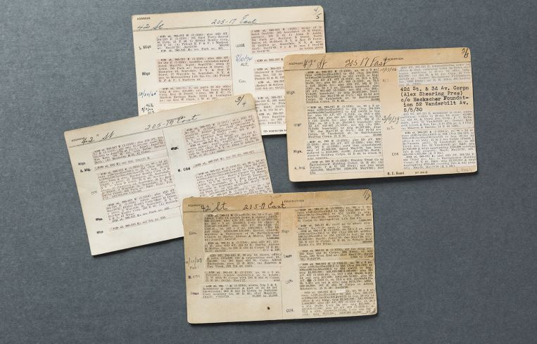 A selection of property cards show the sales, leasing and construction history at 205-217 East 42nd Street.