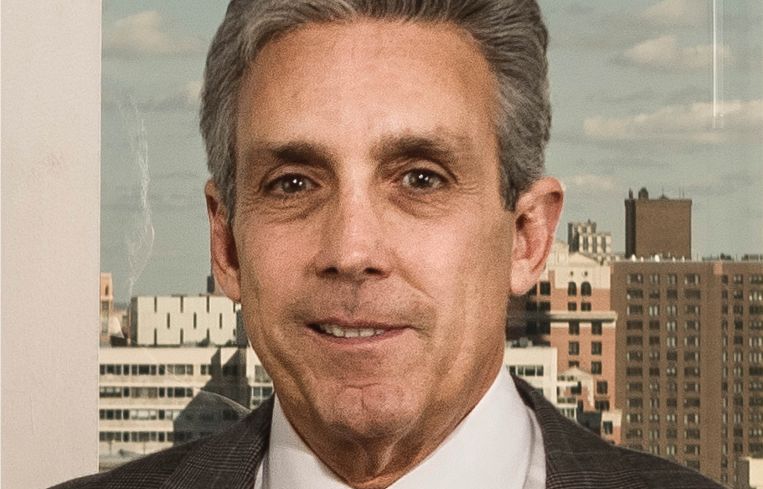 Charles S. Cohen.