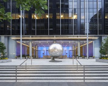 Fisher Brothers' $120 million renovation of 1345 Avenue of the Americas includes an updated plaza with added seating, plantings and a new sculpture.
