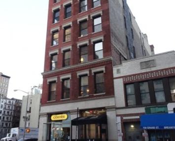 The brick building at 154 Grand Street in SoHo, which was home to the first WeWork in New York City.