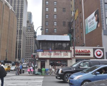 The two-story building 416 Eighth Avenue.
