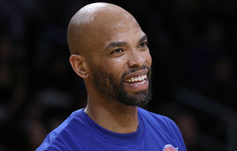 Taj Gibson smiles during warm-ups